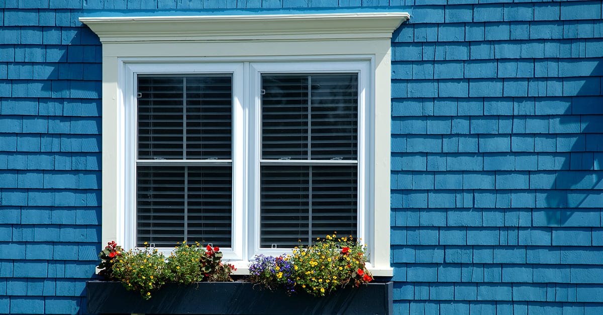 blue painted cedar siding on home in Portland