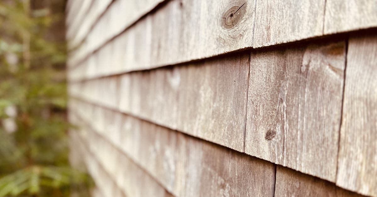 side view of home with cedar shingle siding